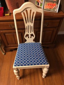 The chair is now white white a cobalt blue and white pattern.